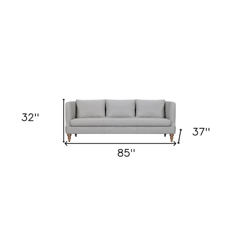 85 graues Ledersofa mit braunen Beinen
