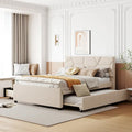 Lit plateforme beige full size en lin avec tête de lit à motif de briques, lit gigogne et tiroirs de rangement