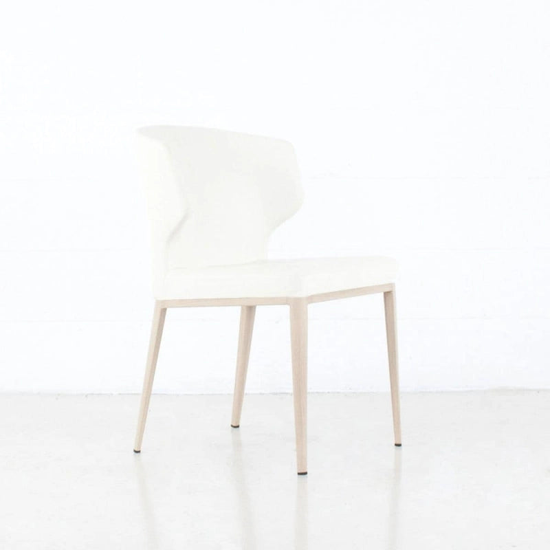 Chaise de salle à manger moderne du milieu du siècle en similicuir avec dossier enveloppant