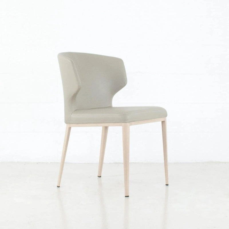 Chaise de salle à manger moderne du milieu du siècle en similicuir avec dossier enveloppant