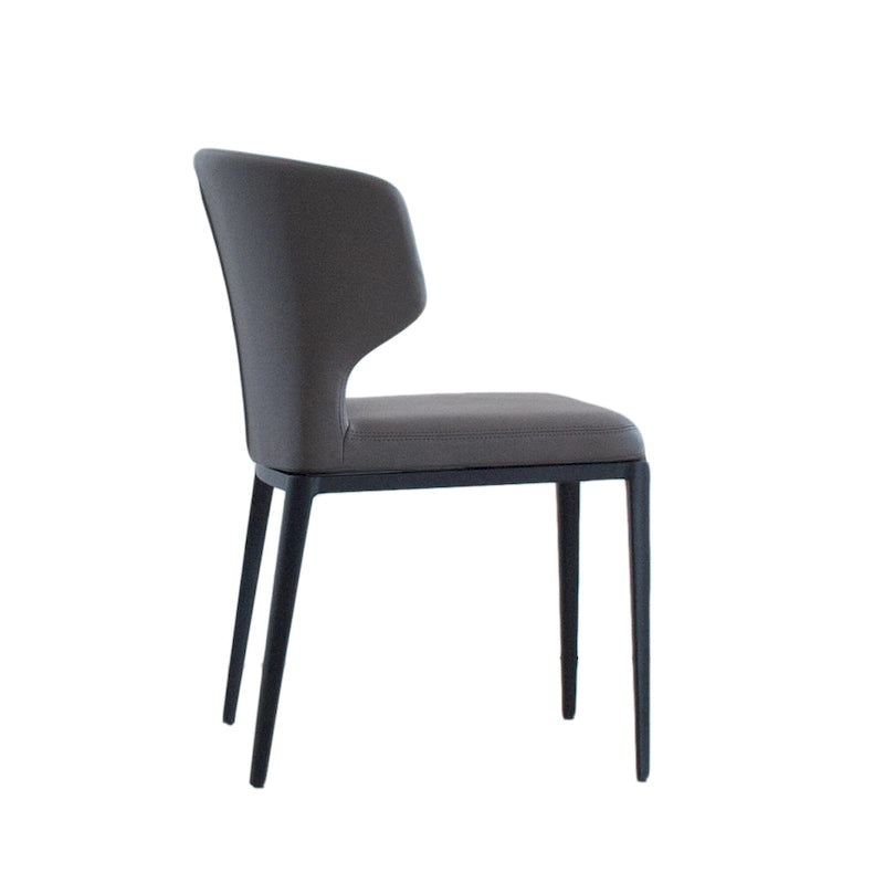 Chaise de salle à manger moderne du milieu du siècle en similicuir avec dossier enveloppant