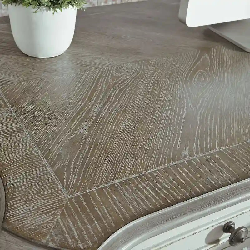 Distressed white faux-antique desk with bark-like texture